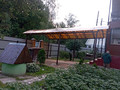 арочный навес для загородного дома из поликарбоната